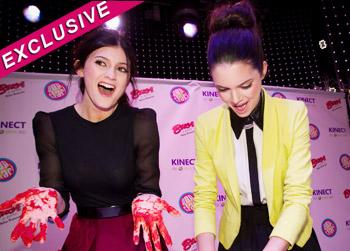 //kylie kendall jenner handprints marinara sauce