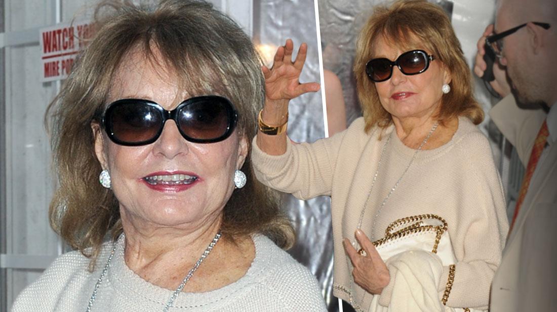 Smiling Barbara Walters Wearing Tan Scoopneck Sweater With Tan Slacks And Sunglasses at the 'Cafe Society' film premiere