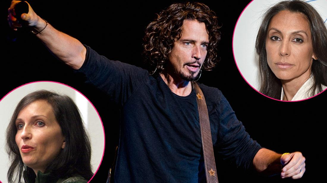 Chris Cornell wears a black shirt and has a guitar around his chest.