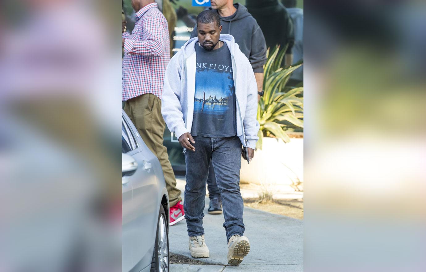 Kanye West Leaves Studio With Pantless Model Amid Marriage Problems