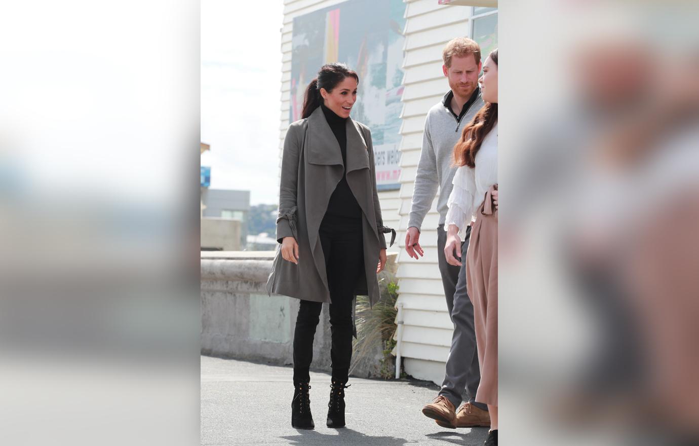 Meghan Markle Covers Baby Bump With A Coat