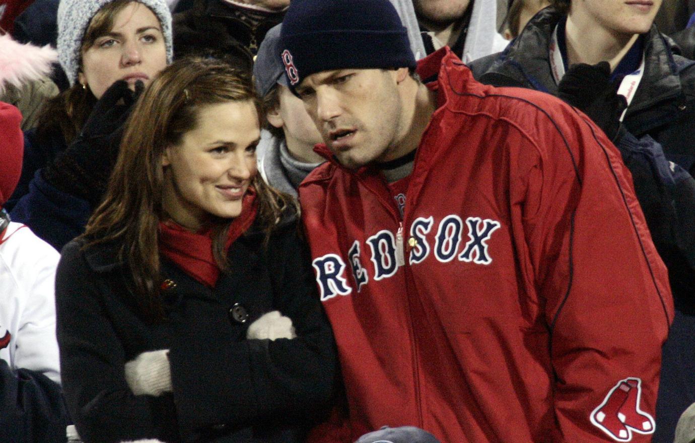 Ben Affleck wore a winter Boston Red Sox cap, along with a red Red Sox jacket, while Jennifer Garner bundled up in a black overcoat with a red scarf.