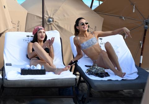 Kendall Jenner Straddles Bestie Bella Hadid During Hot Beach Trip