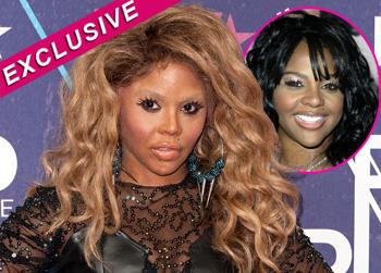 //lil kim plastic surgery getty