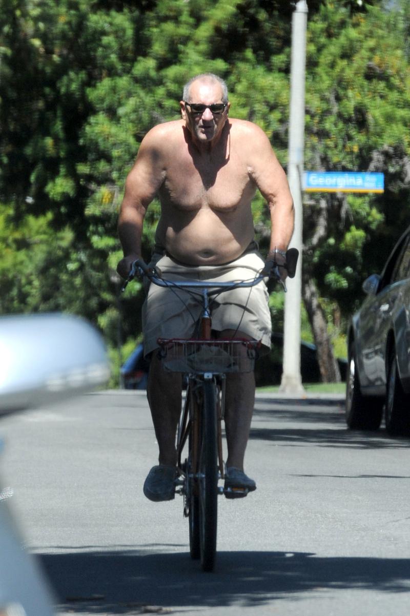 //ed o neill shirtless weight bike ride