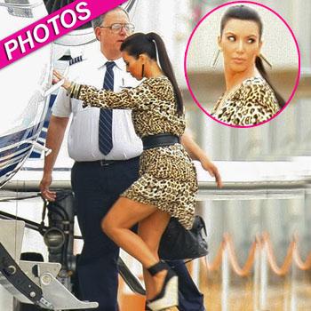 //kim kardashian leopard dress private plane vegas inf