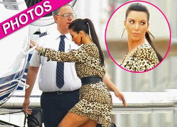 //kim kardashian leopard dress private plane vegas inf