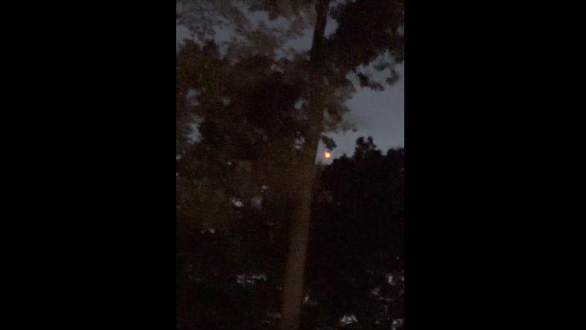 New video recorded by a civilian seems to show glowing red orbs in the sky.