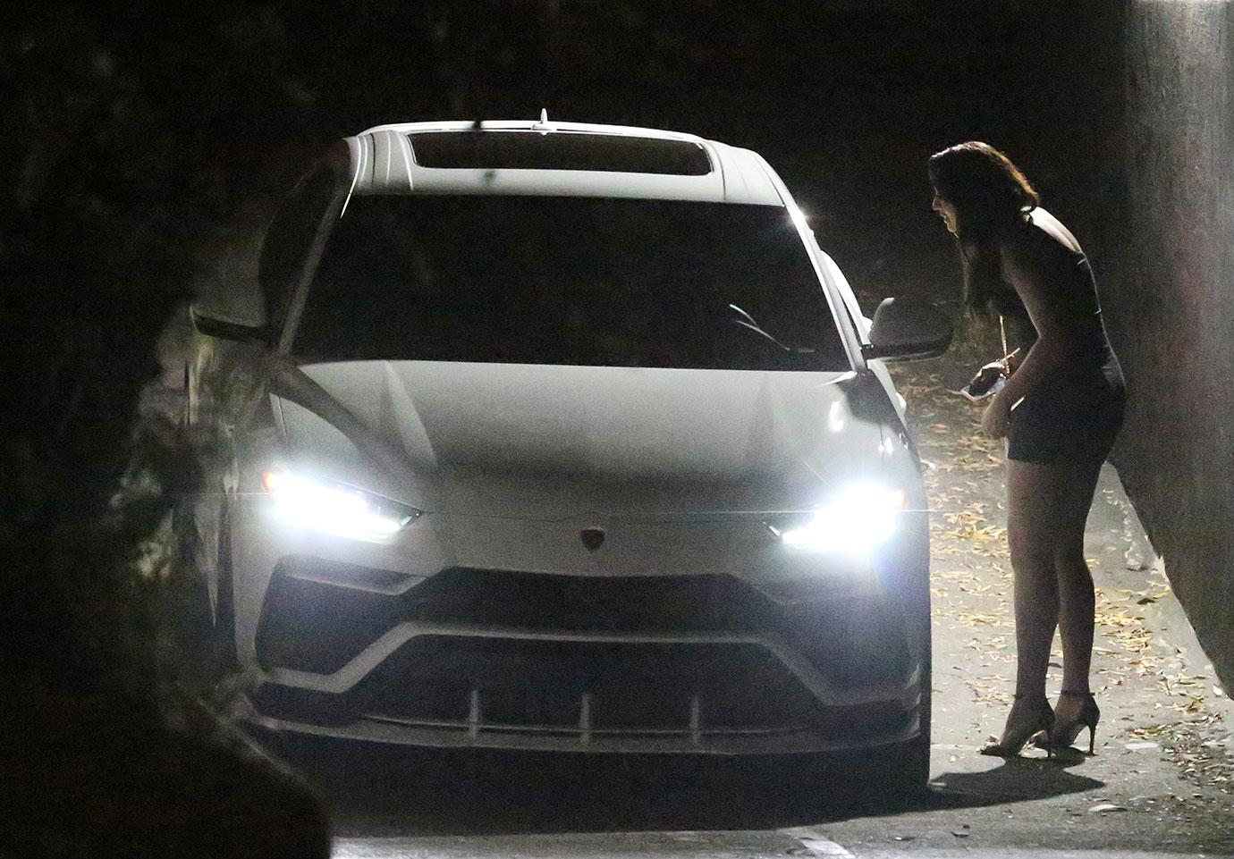 Sela Vave Leaning into Jamie Foxx's Car