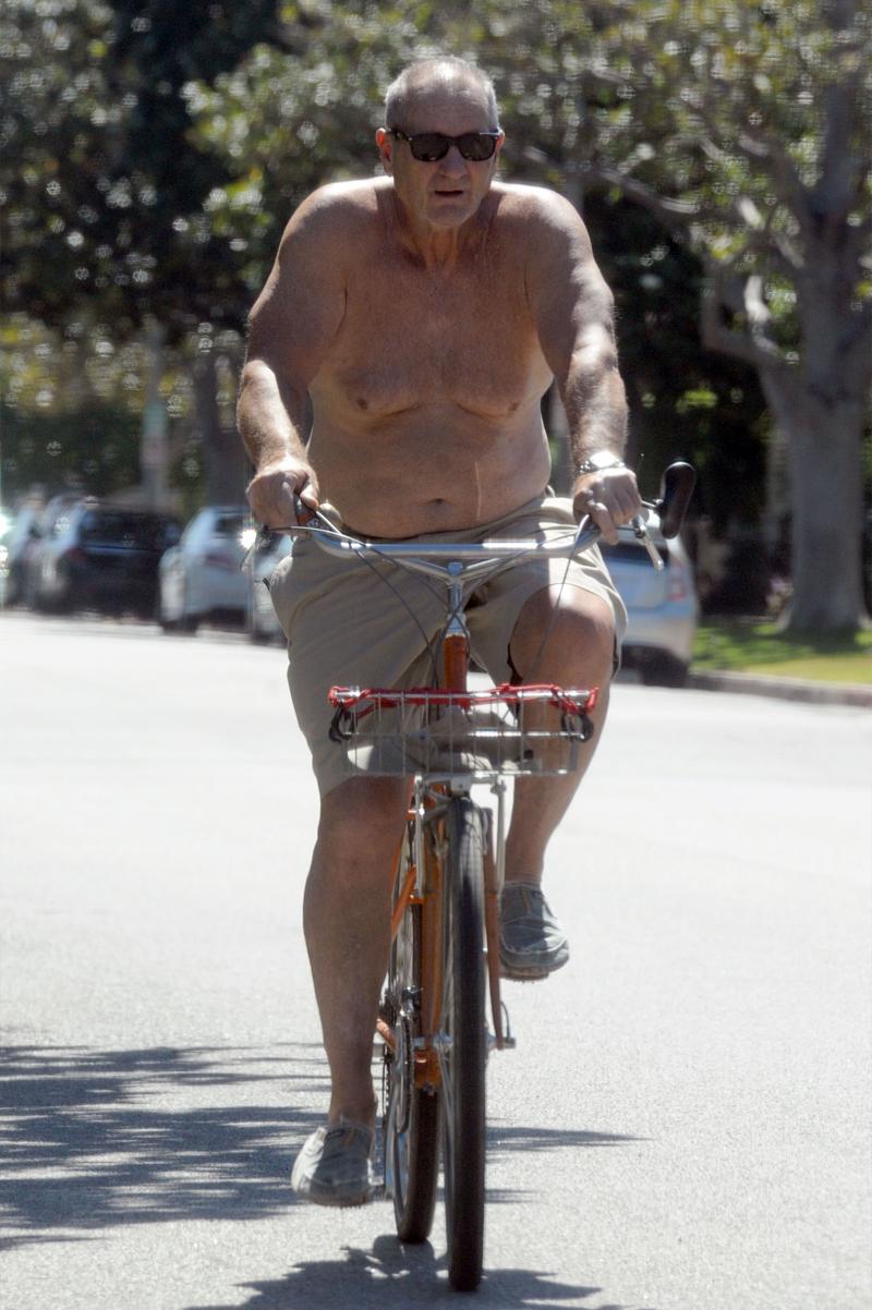 //ed o neill shirtless weight bike ride