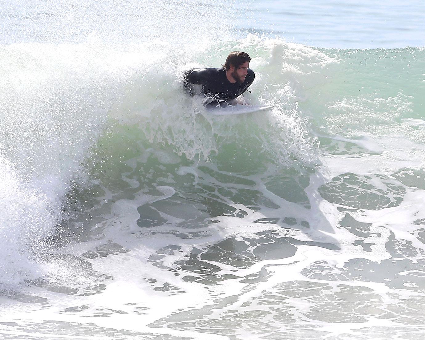 Liam Hemsworth Surfing Malibu Pics