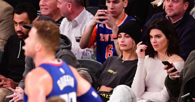Kendall Jenner sits courtside cheering on Blake Griffin.