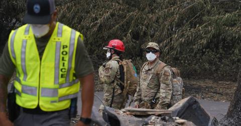 maui wildfires death toll bodies families huddled together pp