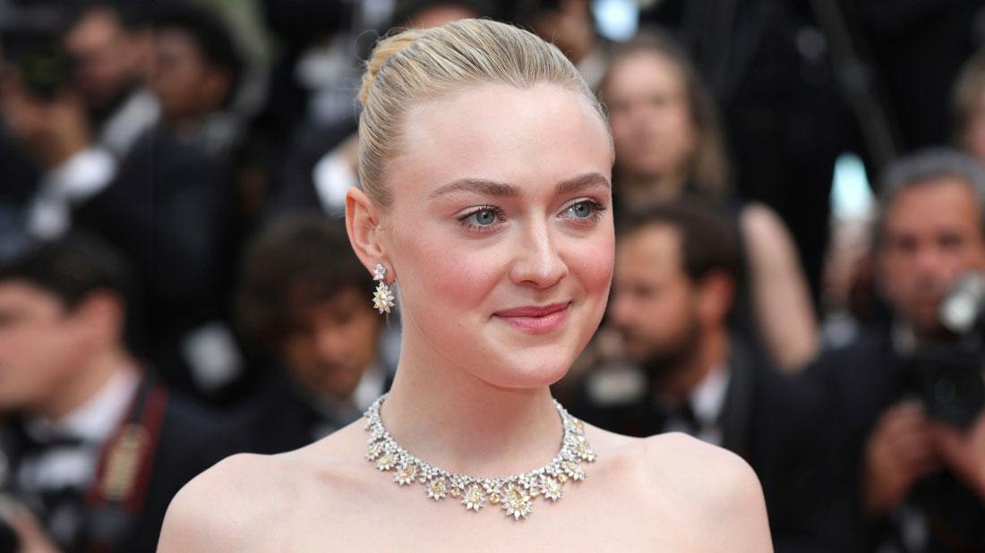 Dakota Fanning Wearing White and Yellow Diamond Earrings and Necklace Shocks Fans By Posting Nude Photo Of Herself Doing Makeup In Bathroom