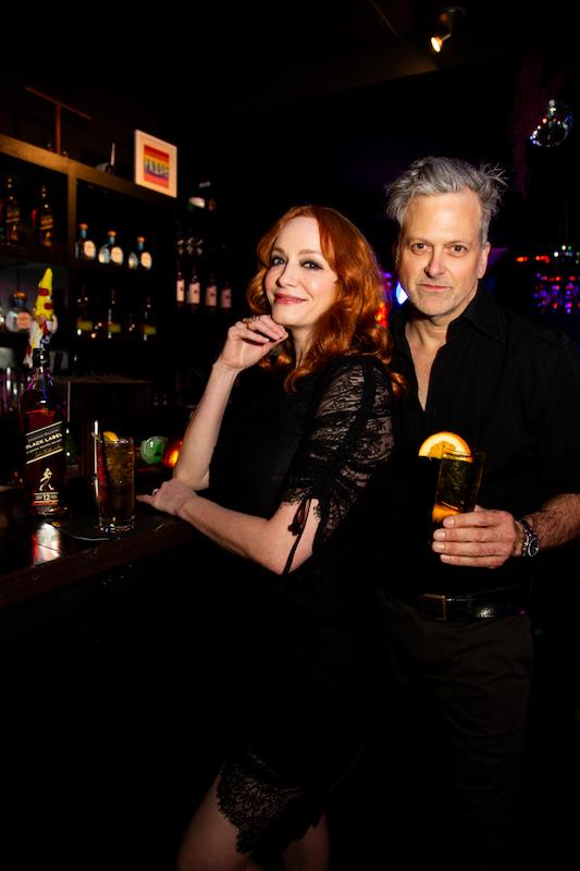 christina hendricks toasts with a johnnie walker black label cocktail to new fiance george bianchinis at his birthday celebration on wednesday evening los angeles ca