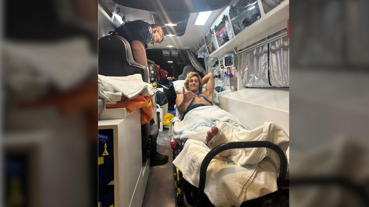image of The 20-year-old said he kicked the shark 'as hard as I could' after it bit his foot.