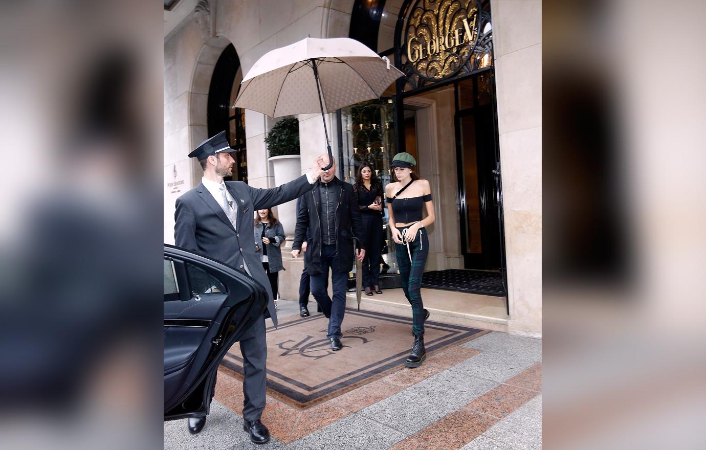 //gaunt looking kaia gerber leaves paris hotel