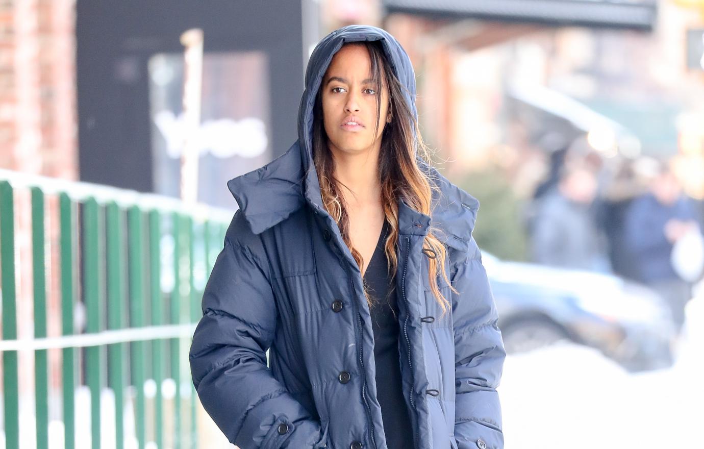 Malia walks in NY in a winter coat