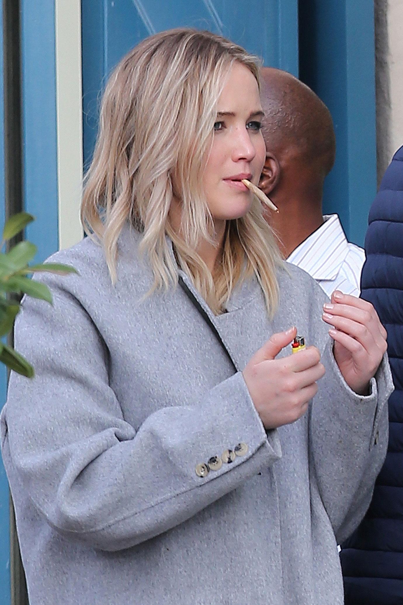 Jennifer Lawrence Smokes Something Suspicious Photos