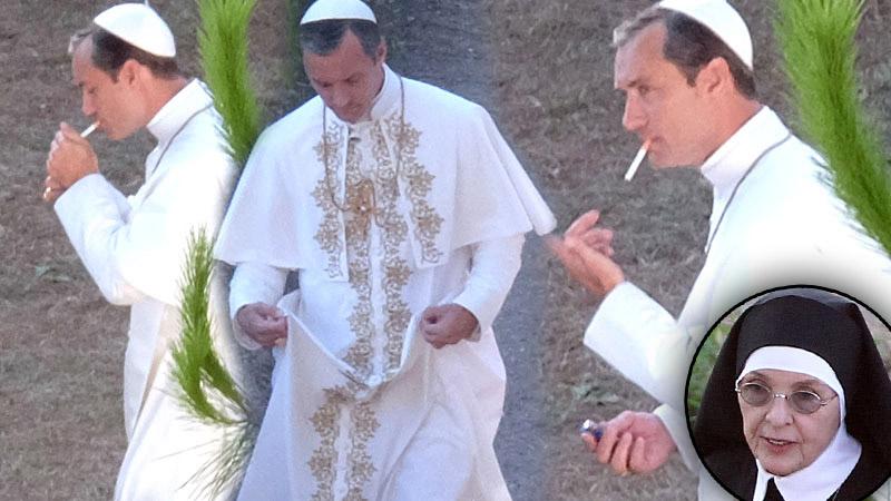 //jude law smokes cigarette dressed up as pope pp