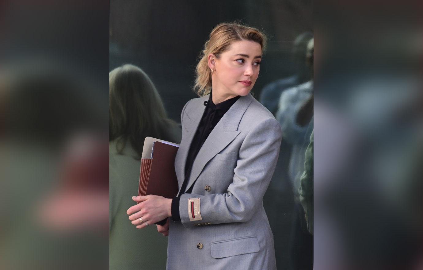 amber heard johnny depp trial spit on him deadbeat