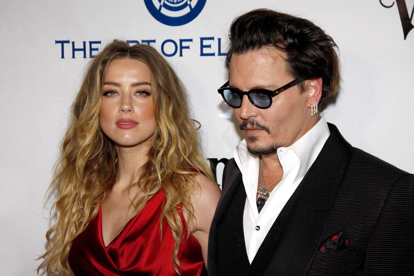 johnny depp sues aclu amber heard  million divorce settlement