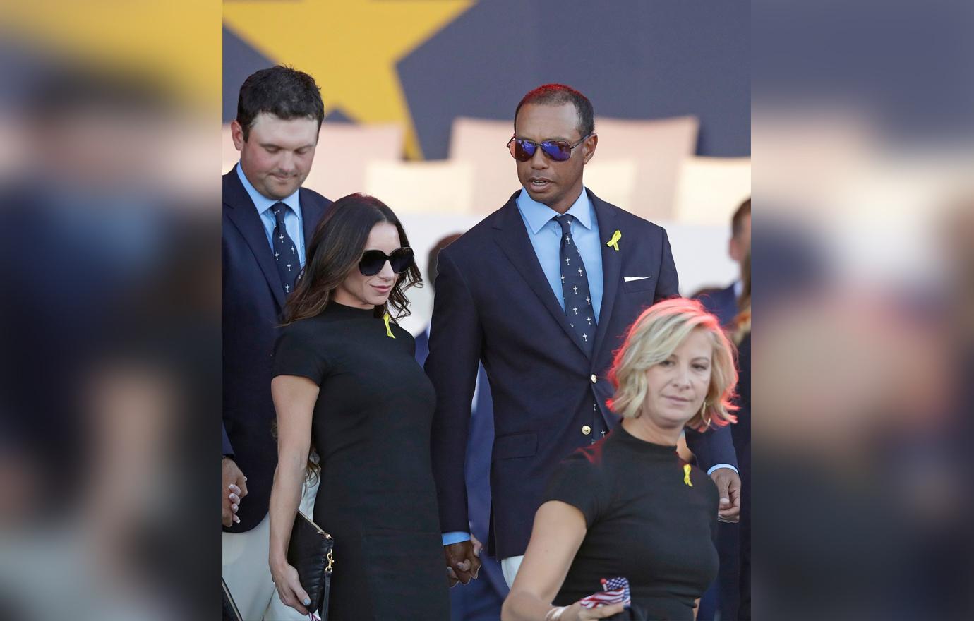 Erica Herman and Tiger Woods Walk Hand in Hand Leaving the Opening of the Ryder Cup