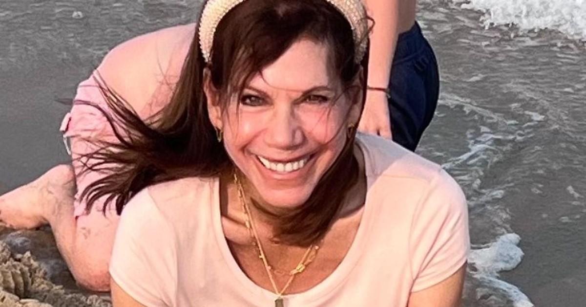 Golden Bachelorette: Theresa Nist Frolics in Swimsuit With Mystery Man