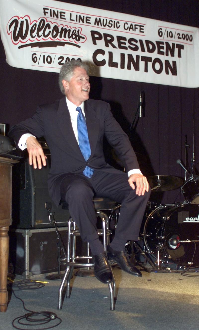 //bill clinton spreads legs manspreading habit presidential election pics