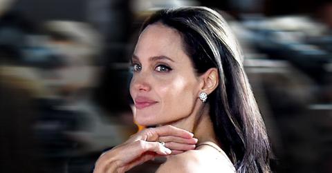 angelina jolie divorce brad pitt removing tattoos