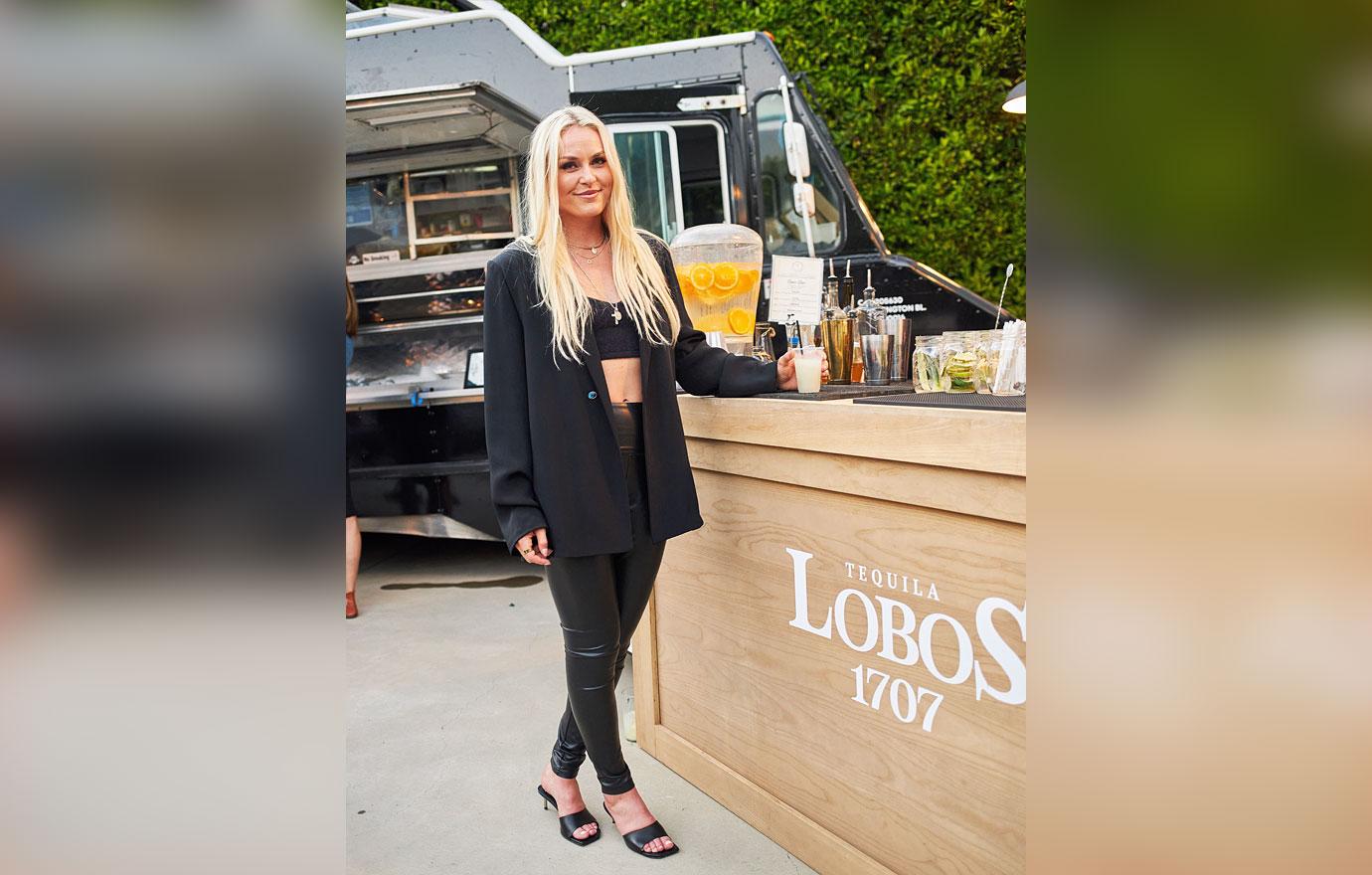 lindsey vonn hosts housewarming party with lobos