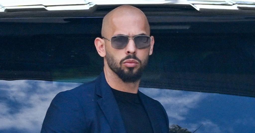 Andrew Tate Appears To Slip Phone To Bodyguard During Arrest