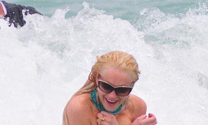 //lindsay lohan loses bikini top