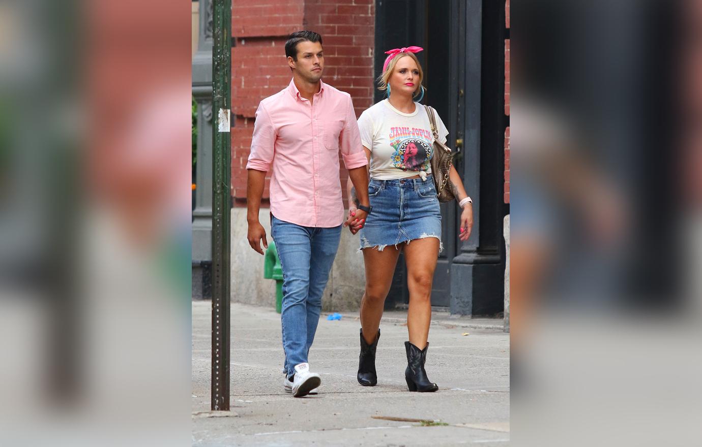 Miranda Lambert and Husband Brendan McLoughlin Seen Walking Holding Hands Outside In Matching Pink and Denim Outfits