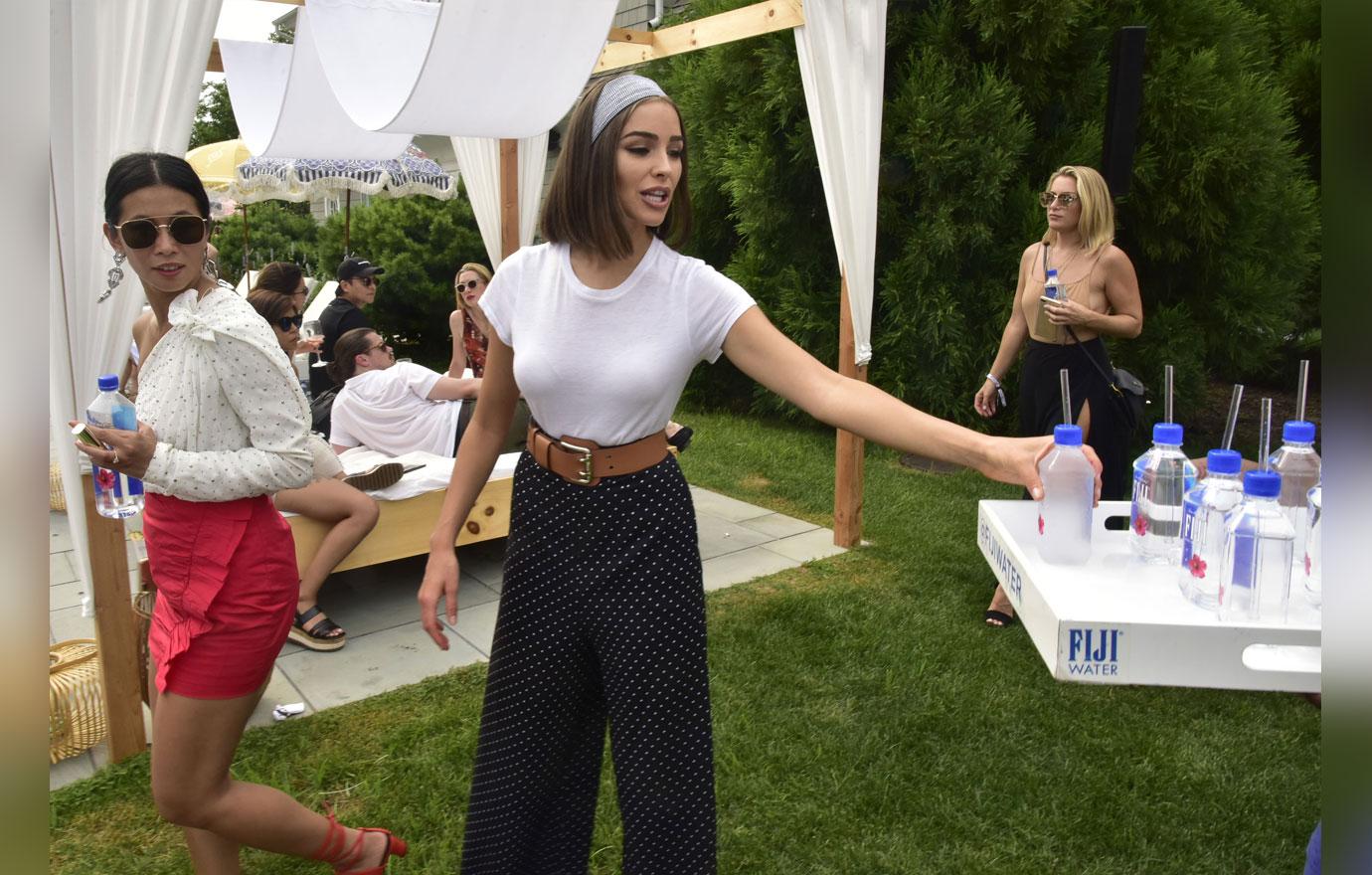 //Olivia Culpo attends the FIJI Water at REVOLVEintheHamptons