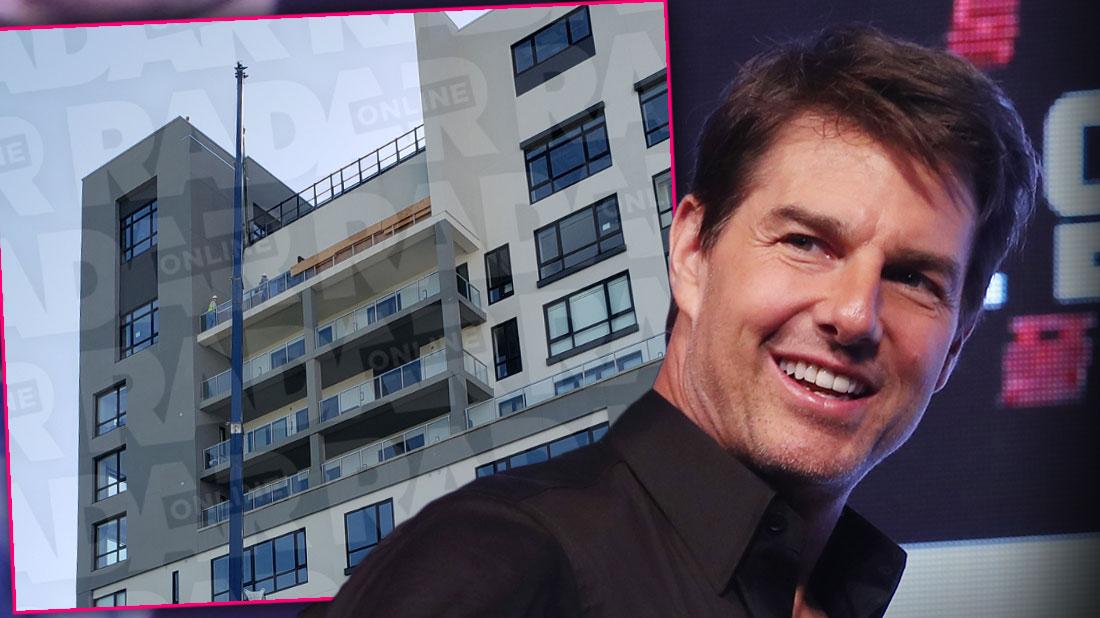 Tom Cruise Wearing Dark Shirt With Inset Of His Scientology Penthouse Still Under Construction In Clearwater FL