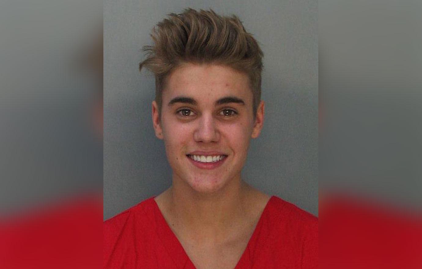 In this handout photo provided by Miami-Dade Police Department, pop star Justin Bieber posed for a booking photo at the Miami-Dade Police Department on January 23, 2014 in Miami, Florida. Justin Bieber was charged with drunken driving, resisting arrest and driving without a valid license after Miami Beach Police found the pop star street racing on Thursday morning.