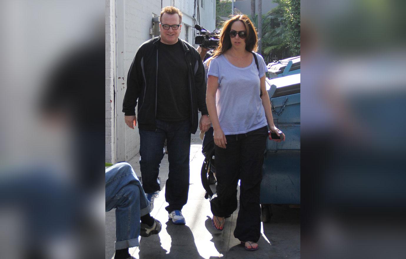 tom arnold divorce fight ex wife  million