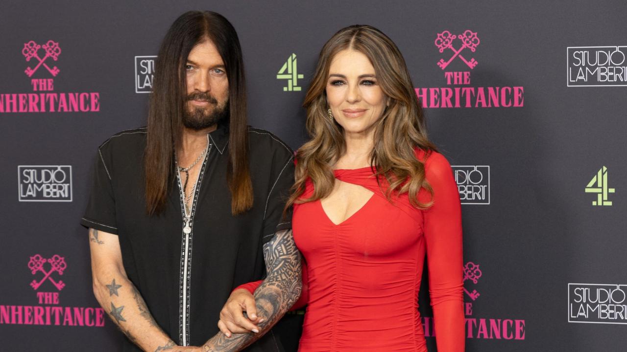Photo of Billy Ray Cyrus, Elizabeth Hurley