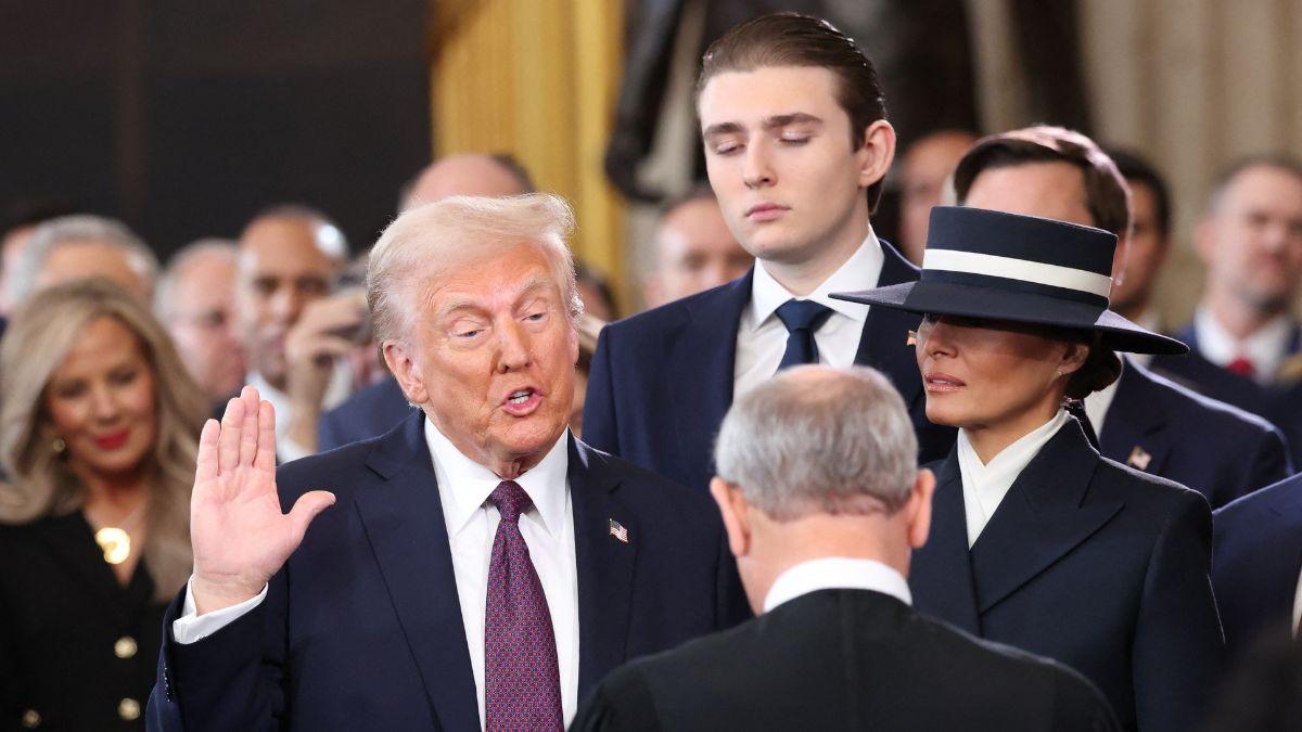 A photo of Donald, Barron and Melania Trump