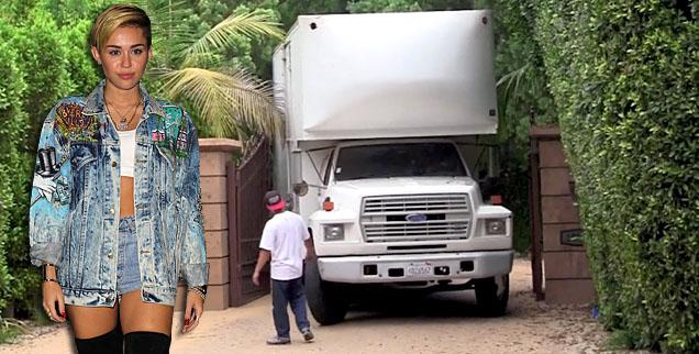 //miley cyrus moving truck wide splash getty