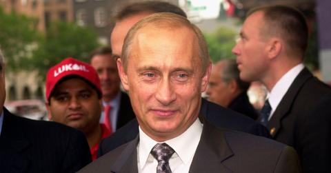 stone faced putin tightly grips table during kremlin meeting with the general as ailing health rumors swirl pp