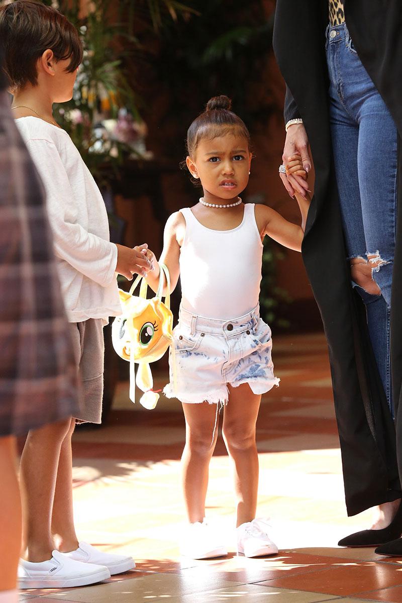 //saint west red carpet baby kim Kardashian kris jenner grandmother store