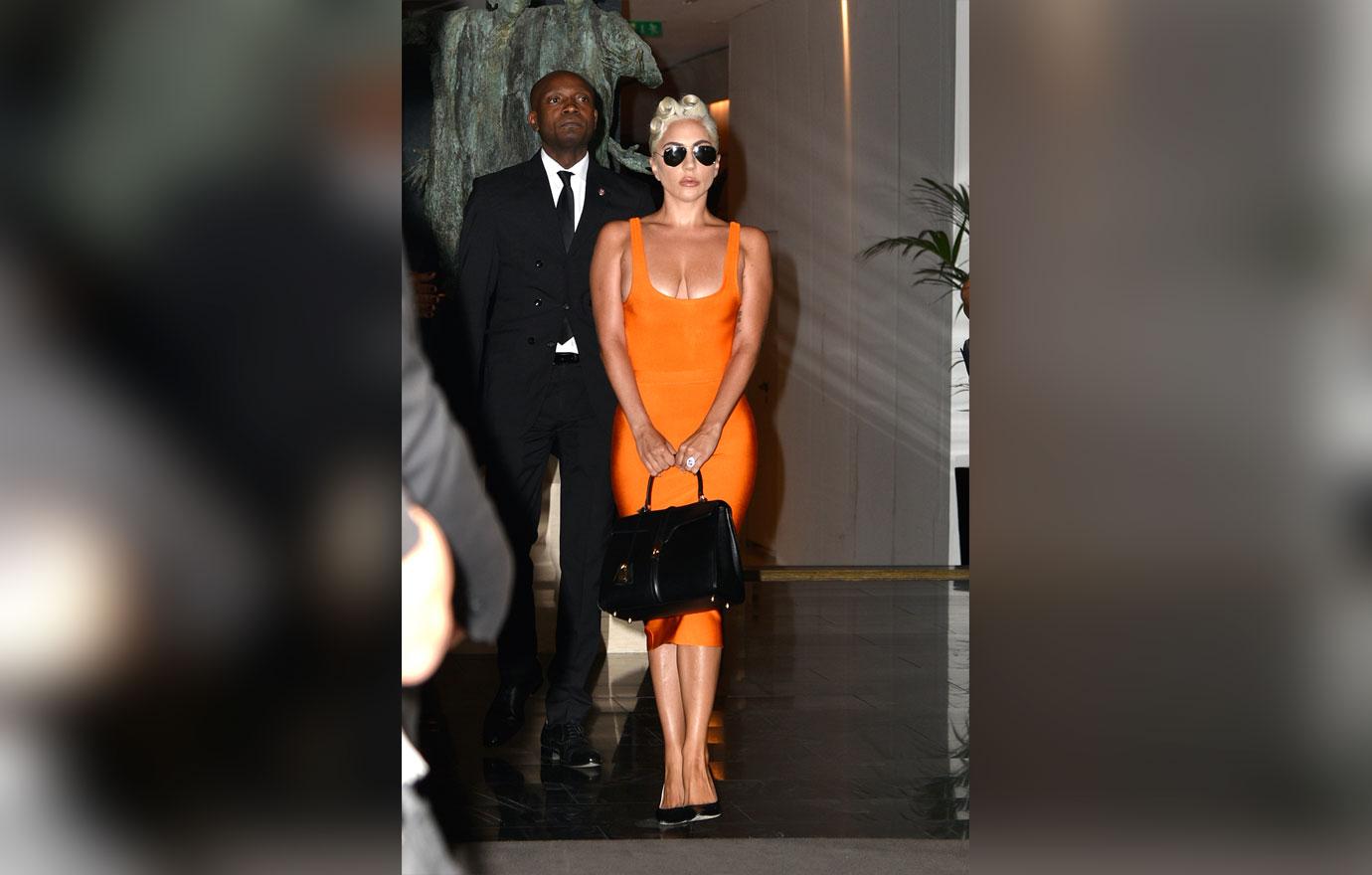 Wardrobe Malfunction! Lady Gaga Shows Nipples In Orange Dress