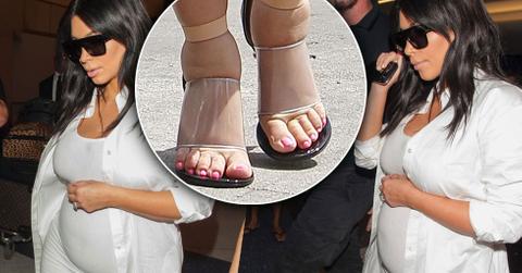 //kim kardahsian flaunts baby bump white dress pp