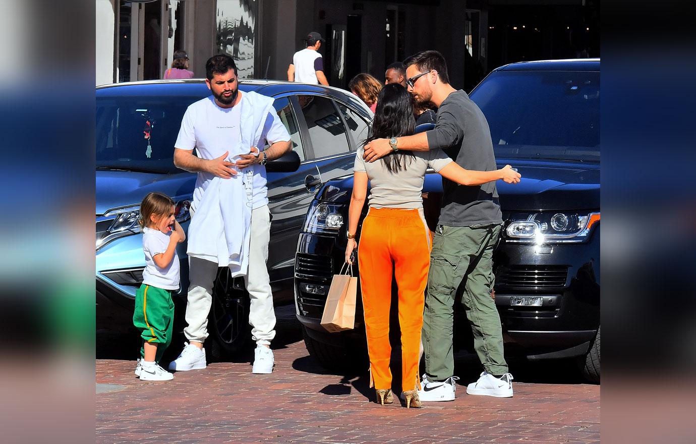 Kourtney Kardashian Hands Son Reign To Scott Disick