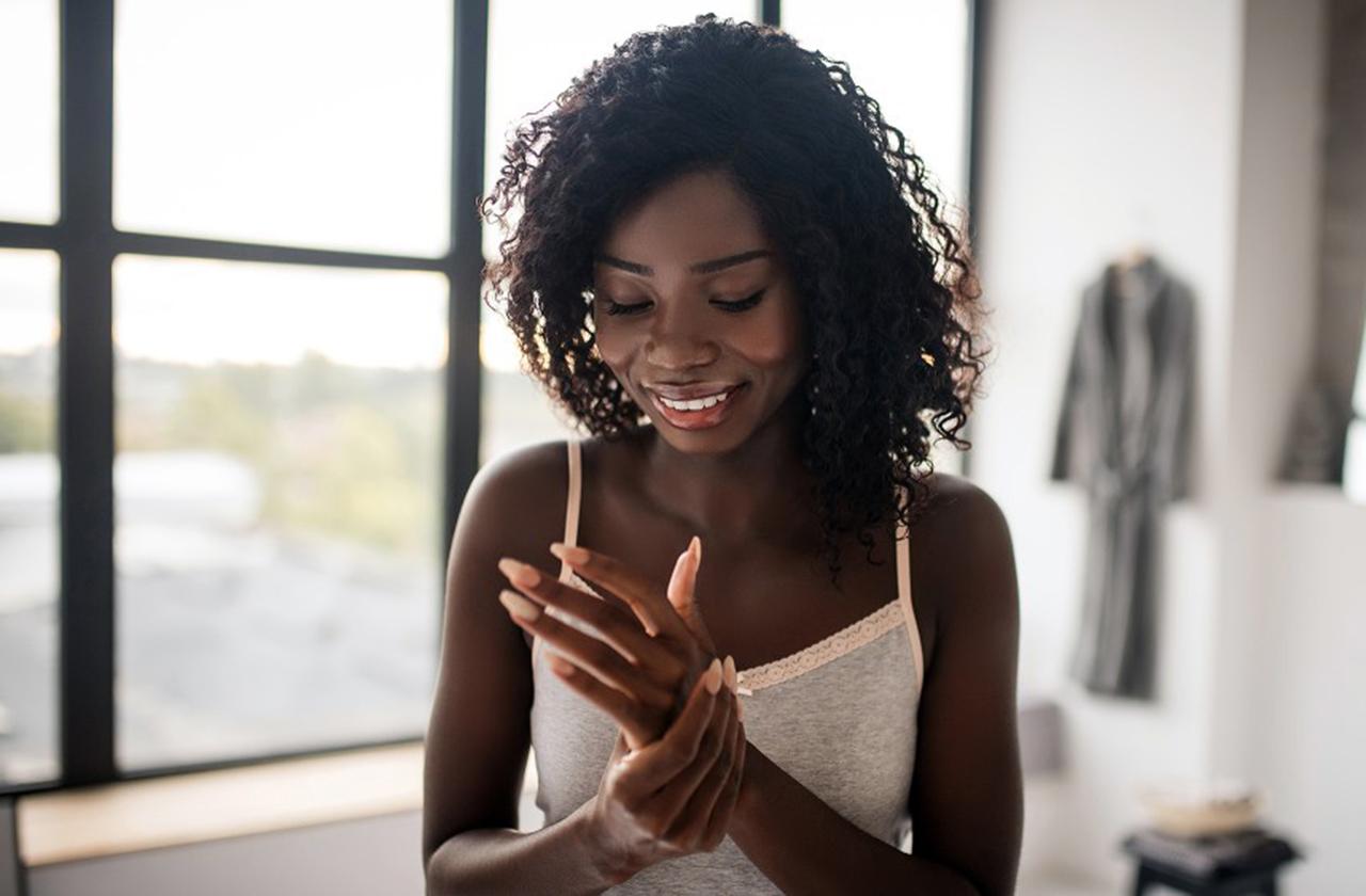 woman using hemp cream