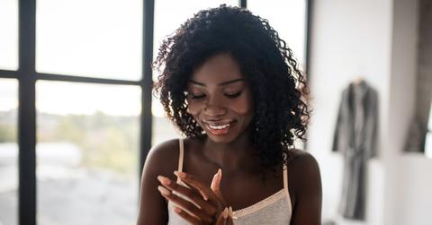 woman using hemp cream