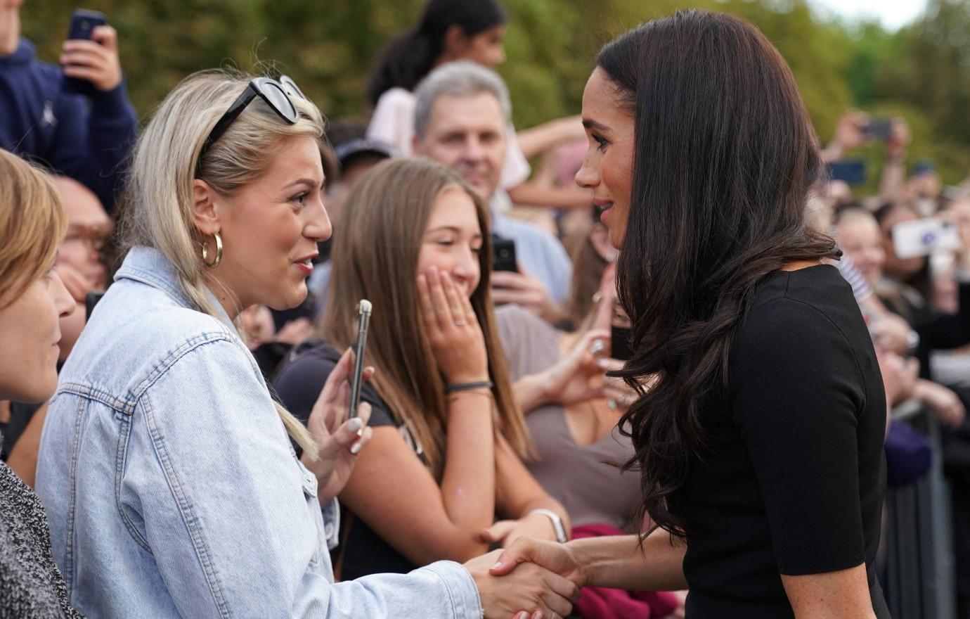 meghan markle prince harry greet mourners windsor