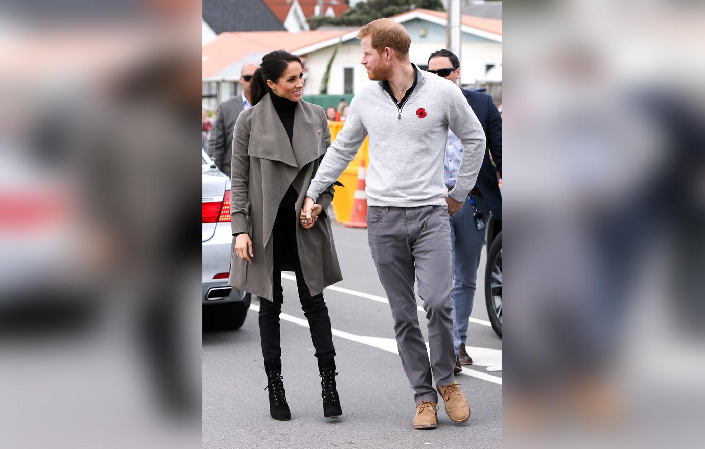 Meghan Markle Covers Baby Bump With A Coat